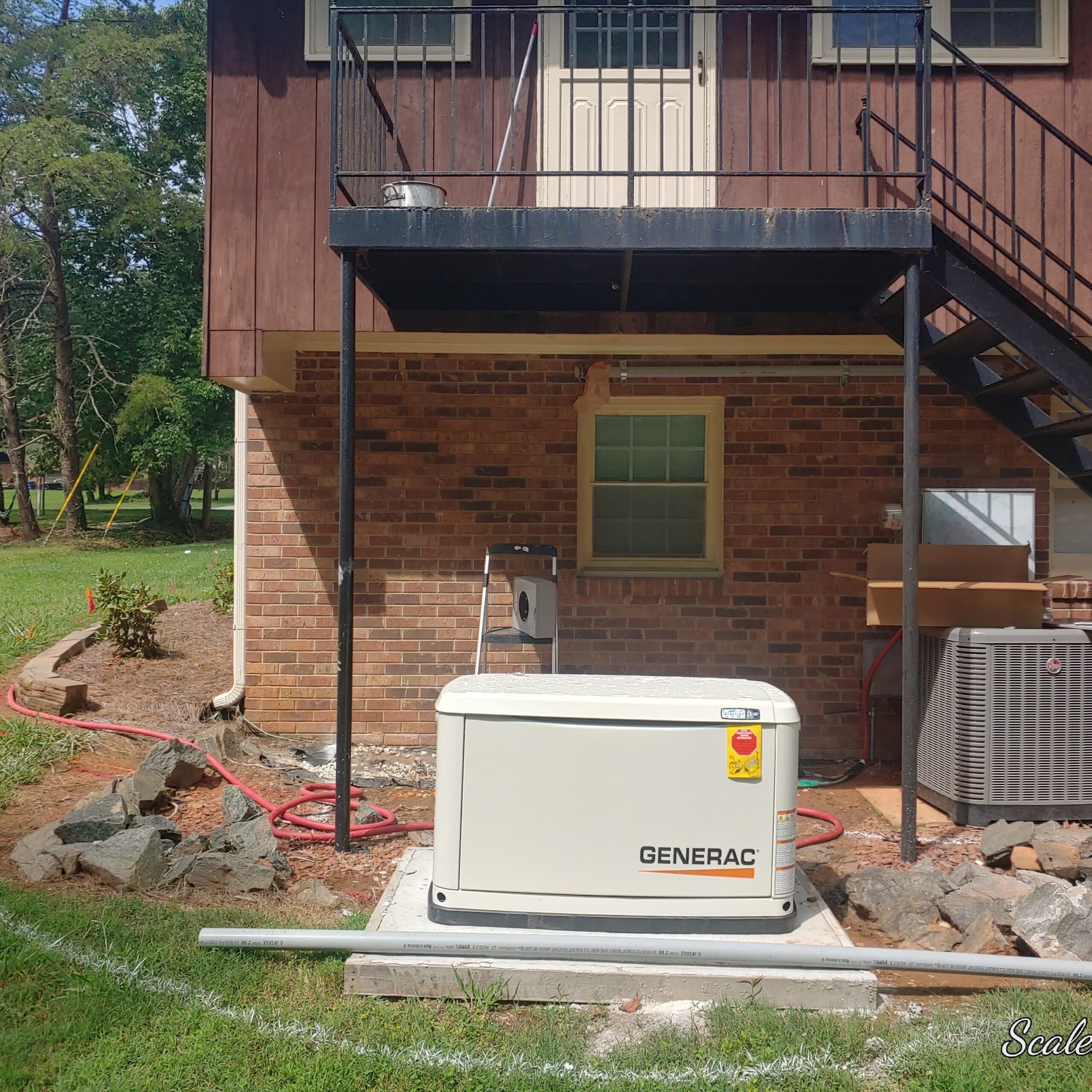 Generac standby generator installed outside a Winston-Salem home by Scales Electrical Service